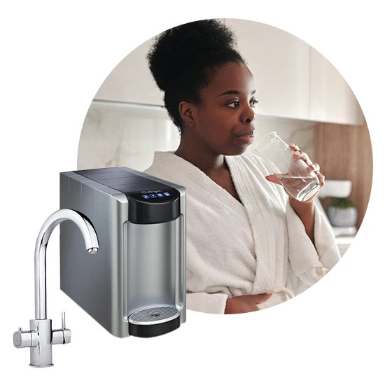 Woman drinking water from Culligan coolers