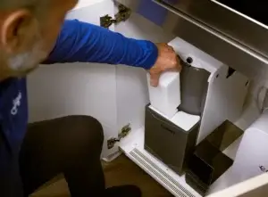 Culligan Arc Water Softener Engineer Filling up the salt