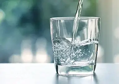 Water being poured into a glass